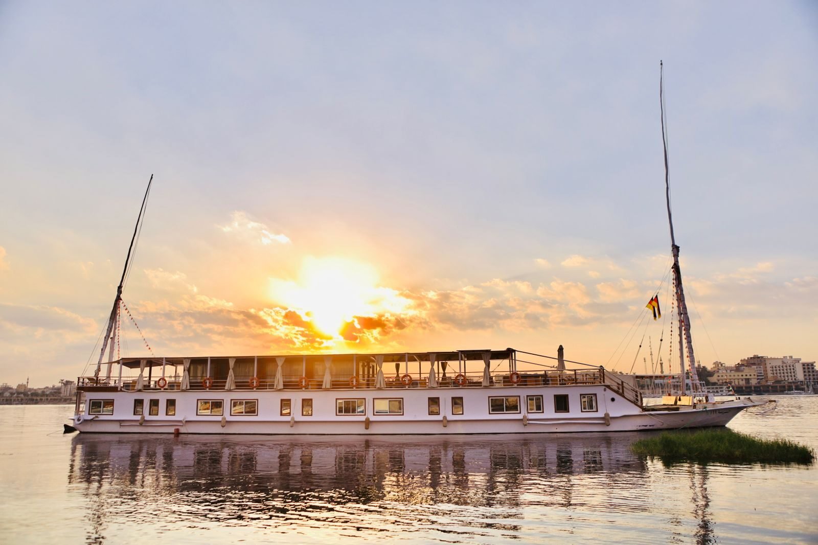 NR-HM dahabiya at sunset on the Nile for a private family journey