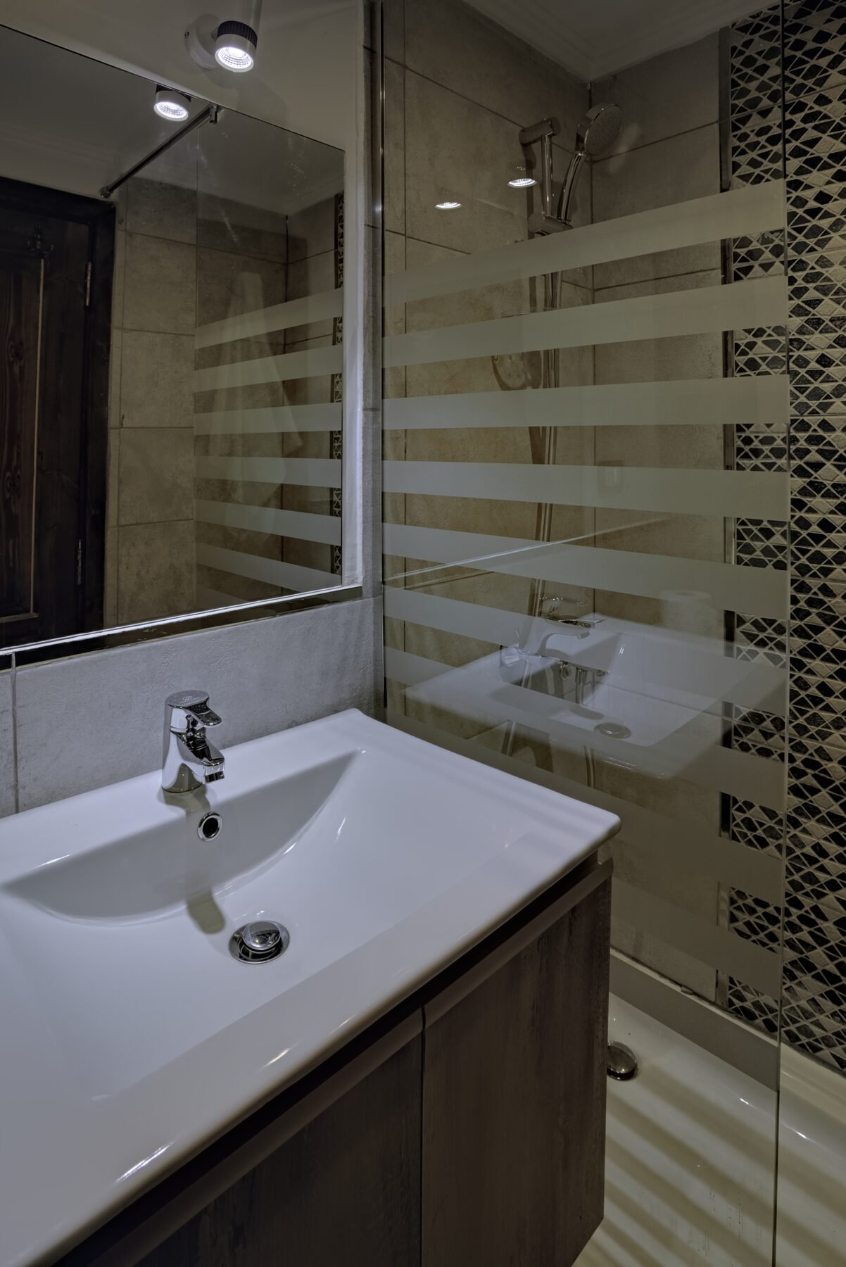 NR-KD dahabiya bathroom with sink, mirror, shower, and onboard comfort details