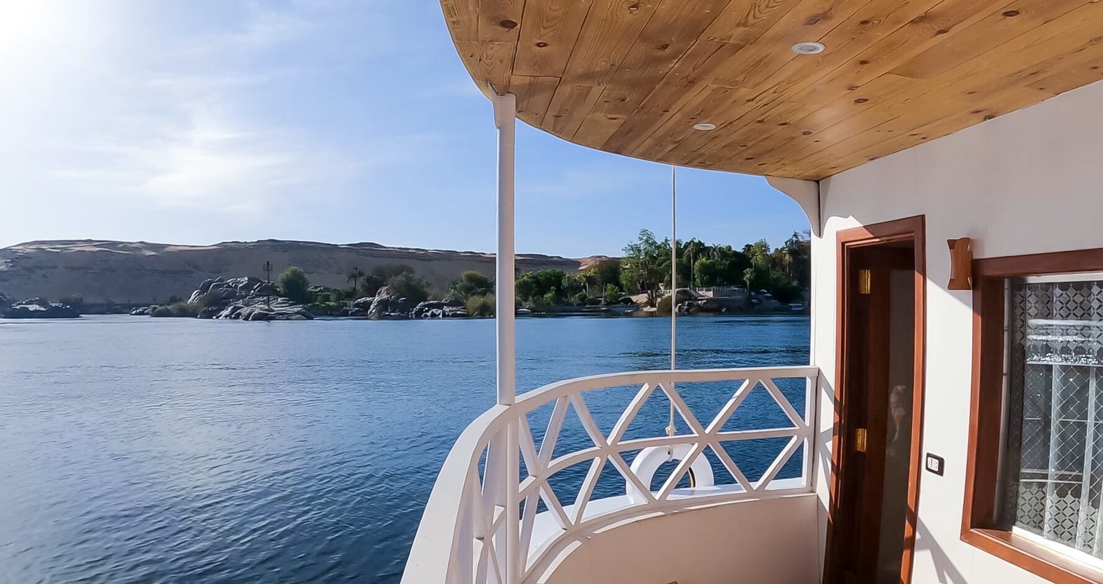 NR-KD dahabiya sunset dining setup on deck with Nile view