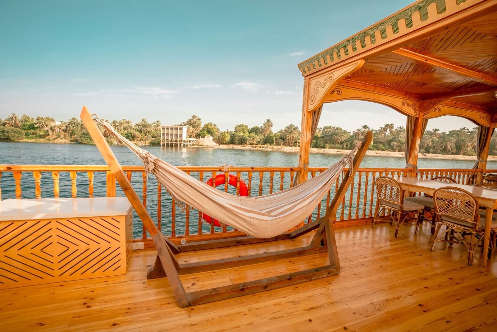 NR-KZ dahabiya upper deck with hammock and Nile view for a quiet romantic journey