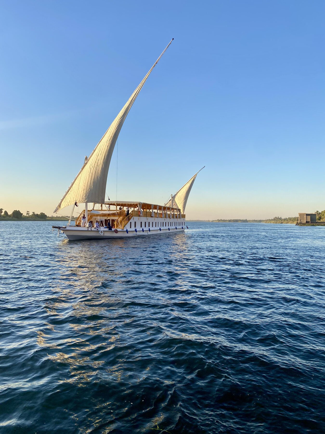 NR-RZ dahabiya sailing on the Nile with a discovery-focused journey atmosphere